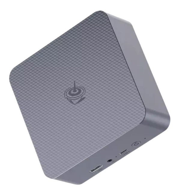 Mini PC Beelink SER em ângulo inclinado, com acabamento cinza fosco e textura quadriculada no topo, exibindo portas HDMI, USB-C, entrada de áudio e botão liga/desliga na parte frontal.